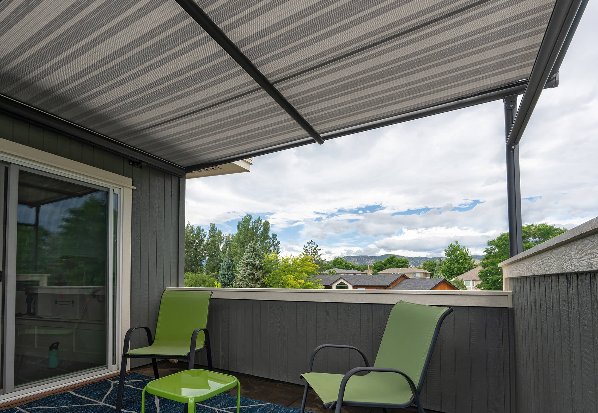 Pinnacle One Gray Stripe Awning on Bedroom balcony